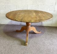 A selection of useful tables, including a pine circular breakfast table, a part painted side table