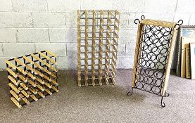 Three assorted wine racks, including a decorative 24 bottle stand, with circular apertures (3)