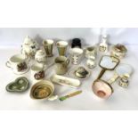 A large assortment of decorative ceramics, including a Elizabeth II crested bell, assorted jugs,