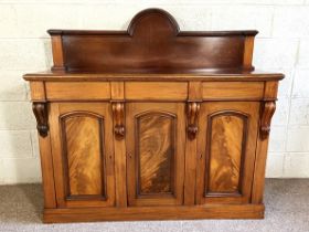 A Victorian mahogany sideboard, circa 1870, with arched gallery back and two frieze drawers over