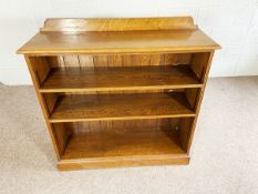 A vintage oak open bookcase, with two adjustable shelves, 107cm high, 108cm wide, 36cm deep