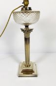 A late Victorian silver plated Corinthian column oil lamp, circa 1900, with a clear cut glass