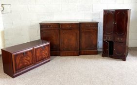 A Georgian style breakfront side cabinet, modern reproduction, with a similar TV cabinet and