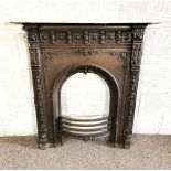 A Victorian cast iron fire surround, with decorative frieze and grille, 100cm high, 90cm wide
