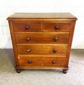 A mid Victorian mahogany straight front chest of drawers, with two short and three long drawers,