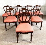 A well made set of eight Victorian style shaped hoop backed dining chairs, 20th century, with padded