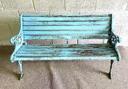 A cast and slatted Victorian style bench, 128cm long