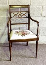 A Regency style armchair, 20th century, with lozenge fret splat and floral tapestry seat