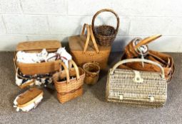 A large and diverse group of American Longaberger woven baskets, including picnic baskets, work