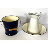 A vintage white enamel wash jug and bowl, together with a blue enamel bucket (2)