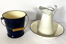 A vintage white enamel wash jug and bowl, together with a blue enamel bucket (2)