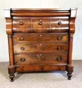 A good and large Scottish Victorian chest of drawers, circa 1860, with breakfront top, a cushion