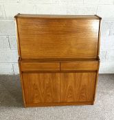 A small veneered writing bureau, mid 20th century, with sloping fall and fitted interior
