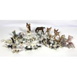 A large assortment of vintage Beswick and similar animal figurines, including horses, Bambi, bears