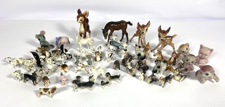 A large assortment of vintage Beswick and similar animal figurines, including horses, Bambi, bears