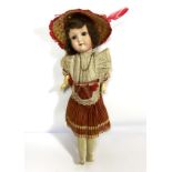 A German bisque socket head doll, early 20th century, with articulated eyes, inscribed to back of