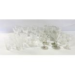 A collection of assorted table glassware including small Georgian style toasting glasses, various