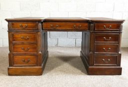 A good vintage George III style pedestal desk, 20th century, with triple leathered top, over