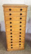 A useful Victorian twelve drawer collectors chest, with ebonized knob handles, 119cm high, 52cm