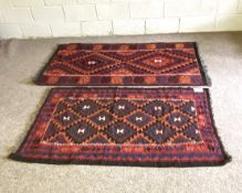 Two small Afghan tribal rugs, with geometric patterned decoration, 186cm x 102cm & 166cm x 99cm (2)