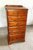 A modern varnished pine chest of six drawers, 103cm high, 45cm wide; and a small corner cabinet (2)