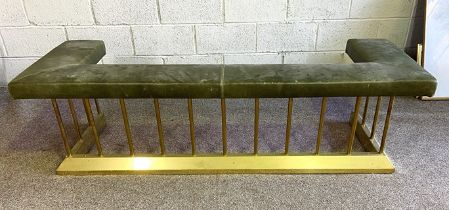 A traditional leather and brass club fender, with a olive green padded leather seat rail, with brass