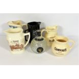 A small group of Whisky collectors water jugs, including Dewar’s White Label, Teachers and