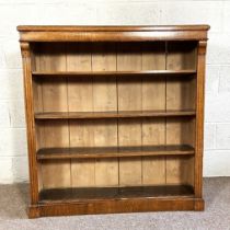 A vintage oak open bookcase, with three adjustable shelves, 112cm high, 104cm wide