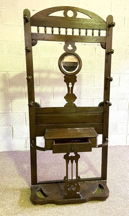 A late Victorian oak hall stand, with arched top, hat hooks and compartments for sticks - Image 2 of 2