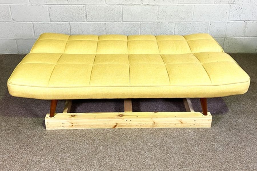 A Dunelm 70’s style ratchet sofa bed, with a folding flat back, upholstered in yellow on deep padded - Image 2 of 2