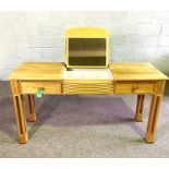 A stylish modern ash wood dressing table, with tilt top mirror set into a rectangular top with