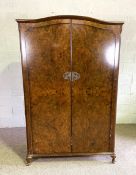A burr walnut veneered double wardrobe, mid 20th century, together with a dressing table (2)