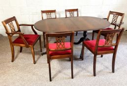 A Regency style dining suite, with a D end table and six chairs, including two carvers