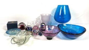 A group of decorative glass paperweights, including a Strathearn flower head dump; also a glass