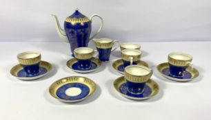 An assortment of tea wares, including an attractive painted coffee service with a matching pot,