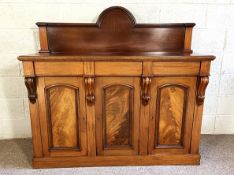 A Victorian mahogany sideboard, circa 1870, with arched gallery back and two frieze drawers over