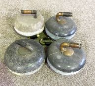 A fine pair of late Victorian granite curling stones, with brass handles, stamped 61 & 62; also