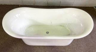 A modern resin cast double ended roll top bath (previously purchased for a renovation but unfitted),