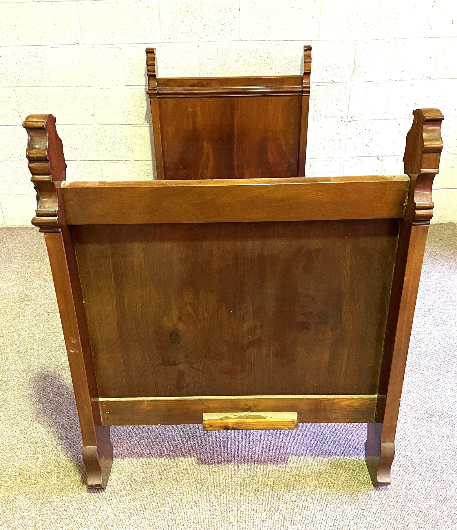 A 19th century mahogany single bed, with acanthus and flower carved finials, panelled ends and a - Image 2 of 6