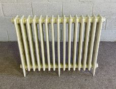A cast iron 15 bar radiator, 76cm high, 96cm wide