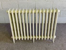 A cast iron 15 bar radiator, 76cm high, 96cm wide