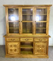 A Contemporary and hardwood display cabinet, (retailed originally by Marks & Spencer) Malabar range,
