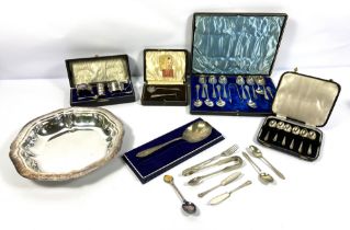 A quantity of silver and silver plate, including a cased set of silver teaspoons and sugar nips,