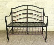 A vintage wrought iron strap-work two seat garden bench, 20th century, 112cm wide