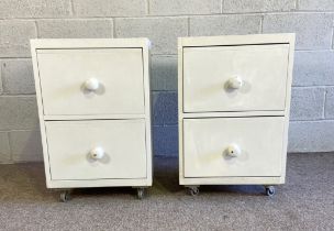 A pair of vintage white painted two drawer chests, 74cm high, 49cm wide