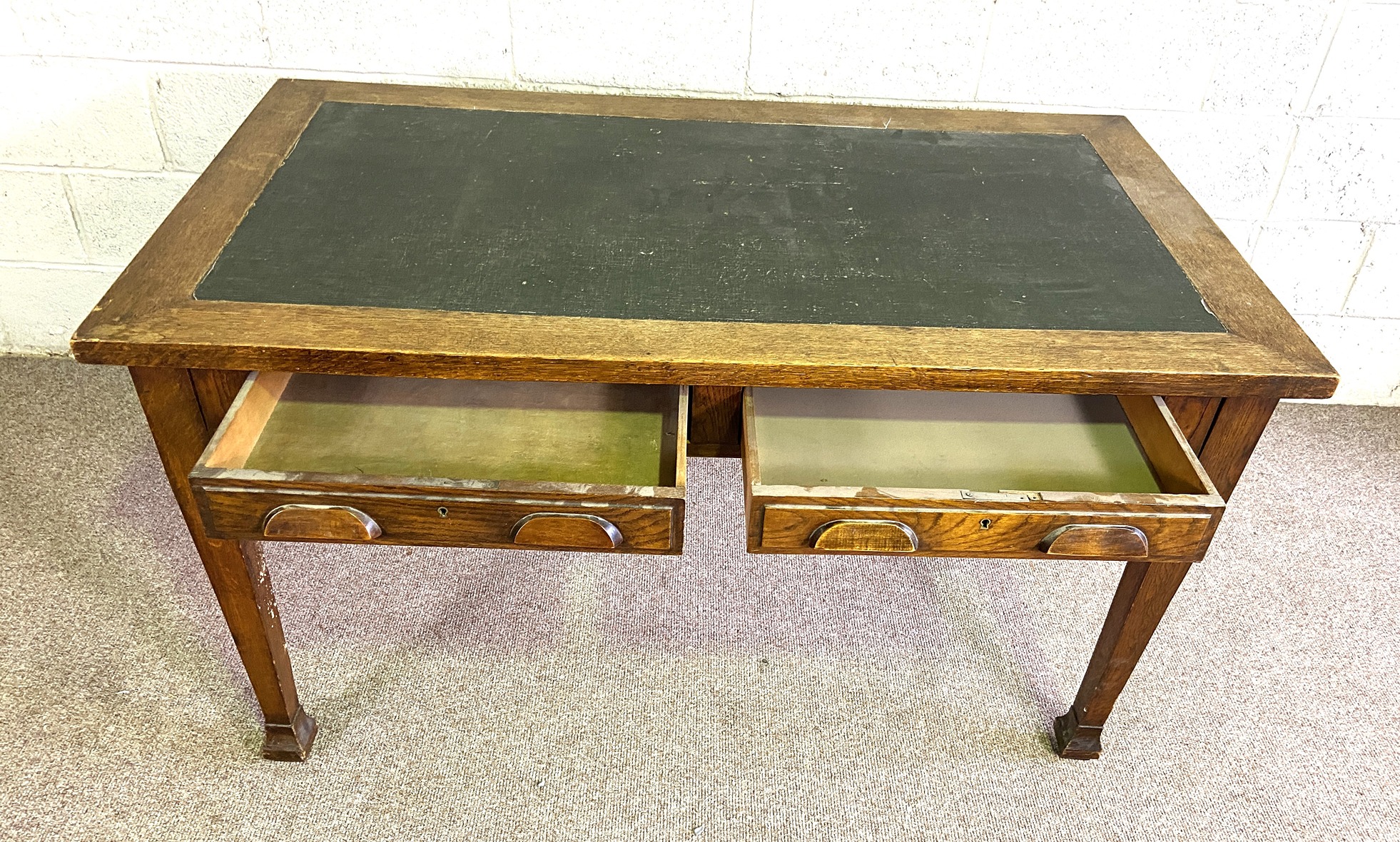 A vintage oak writing table, with ‘leather’ inset top, set on four tapered legs, 80cm high, 140cm - Image 3 of 4