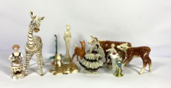 A selection of decorative figures, including Beswick cows; also a gentleman’s silk top hat, “