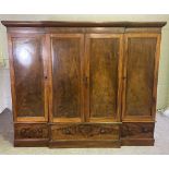 A large and attractive mid Victorian mahogany breakfront linen press and wardrobe, circa 1860,