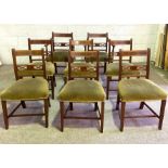 A set of eight late Regency bar backed mahogany dining chairs, 19th century, including two