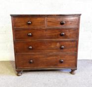 A Victorian mahogany chest of drawers, late 19th century, with straight front and two short and